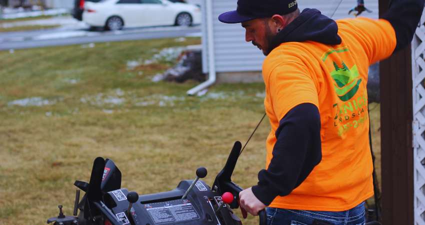 2Knights Landscaping snow and ice removal in Nazareth PA — professional operator using equipment in winter conditions.